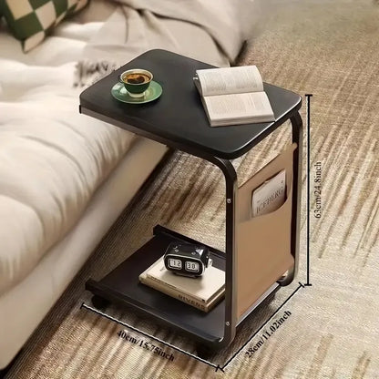 C-Frame Side Table holding tablet and drink in cozy home environment