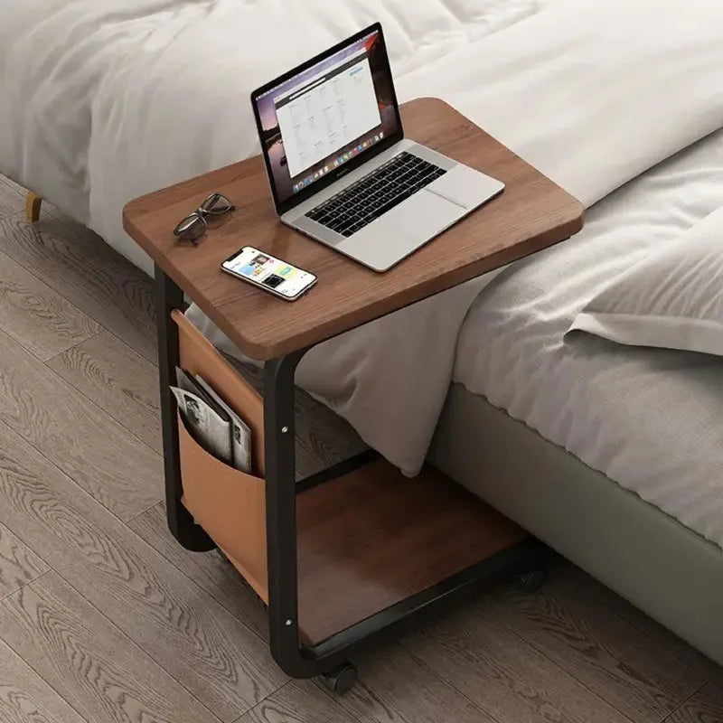 Storage bag attached under C-Frame Side Table holding magazines and remotes