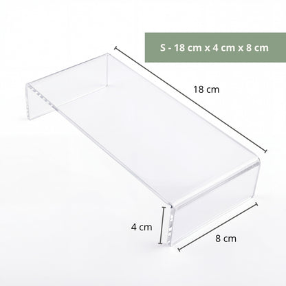 Clear acrylic riser in office display showing award or plaque