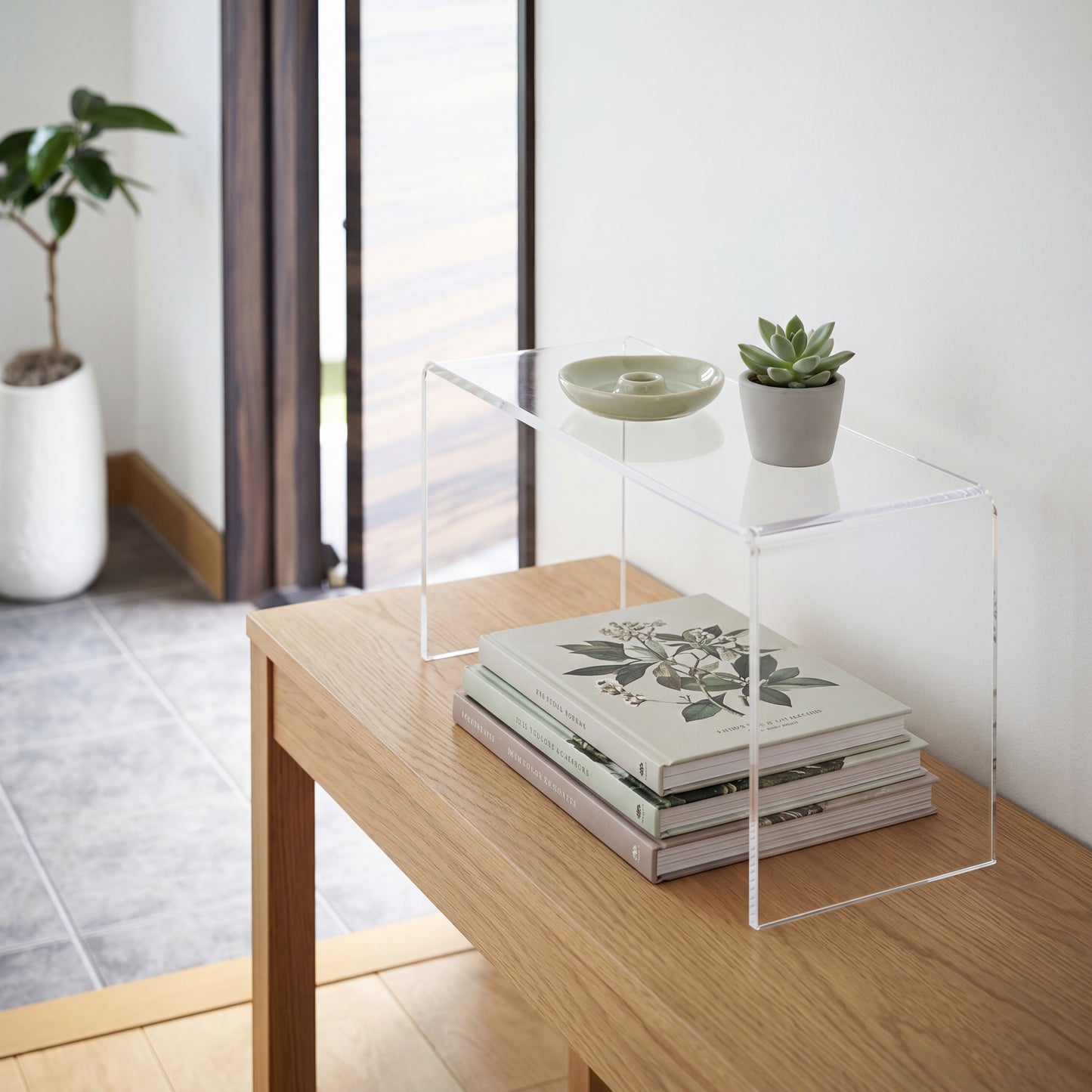 Clear Acrylic Display Riser elevating product on shelf for better visibility