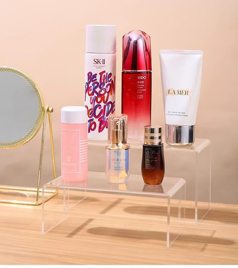 Clear Acrylic Display Riser used in retail display to showcase small items
