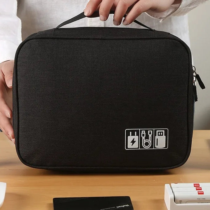 Travel Cable Organizer Bag showing USB hubs power bank and cables organized